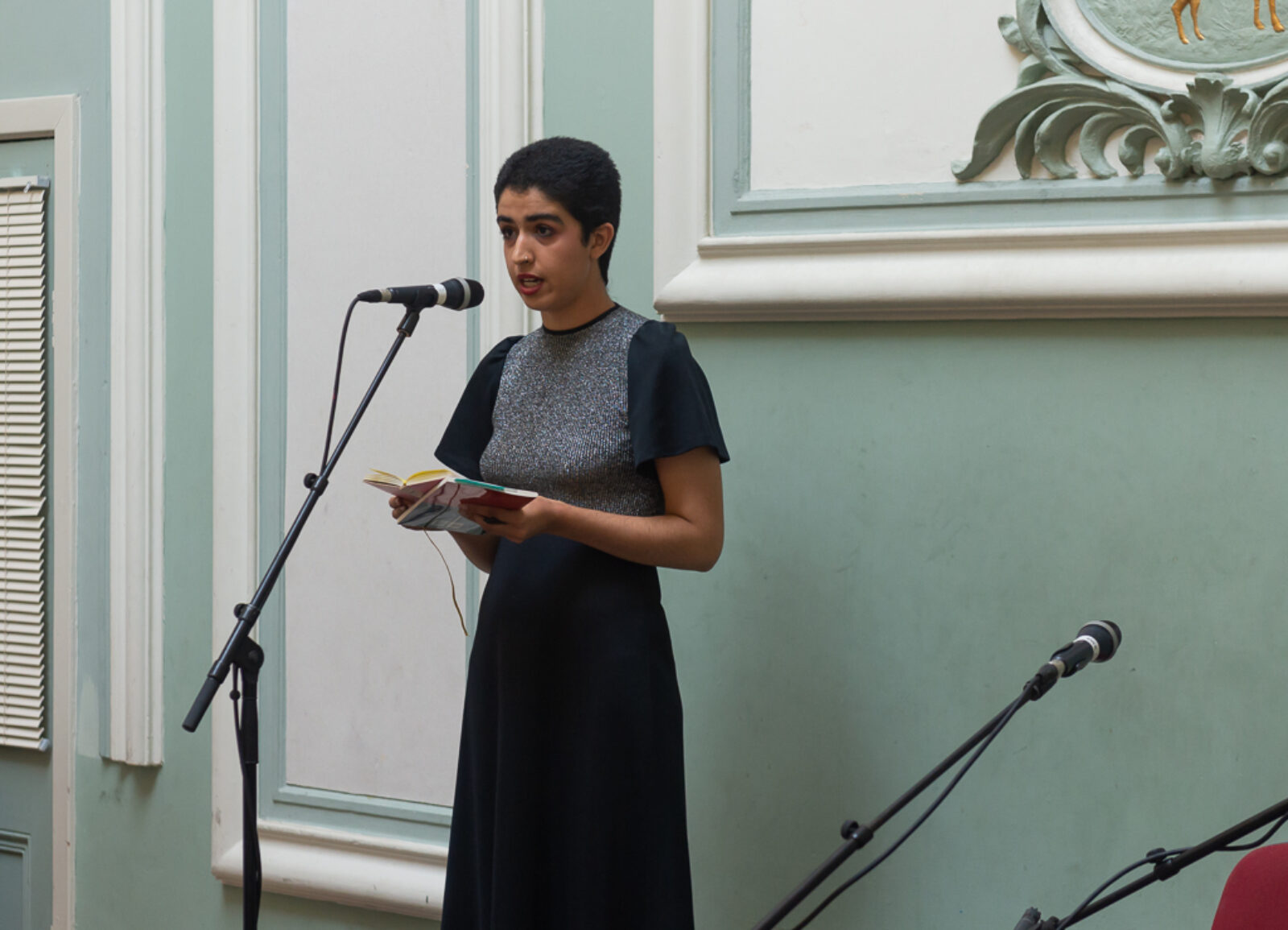 Project Curator, Niloo Sharifi, welcomes everyone to Toxteth Town Hall and introduces Arrival City. Summer Social: Aurora & Arrival City at Toxteth Town Hall, July 2018. Photo by Brian Roberts.