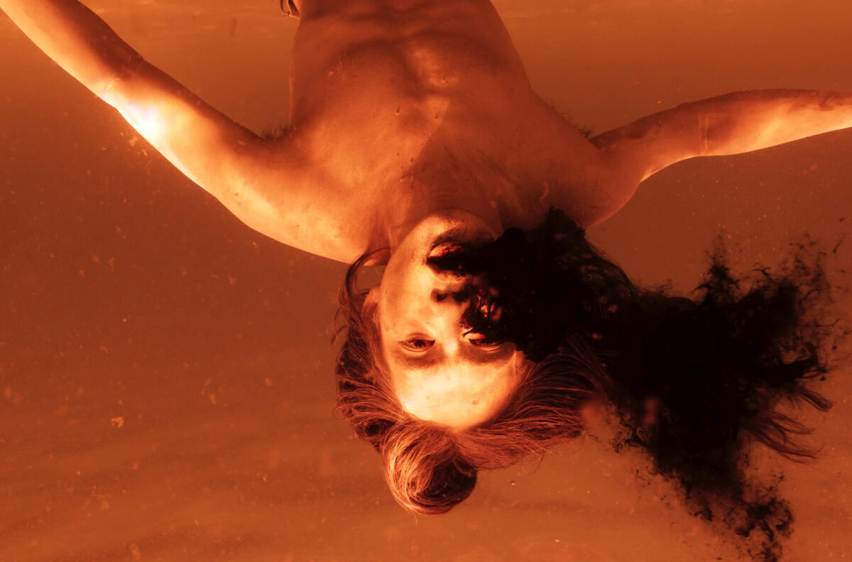 Korakrit Arunanondchai and Alex Gvojic, still from Songs for living (2021). Courtesy of the artist, Bangkok CityCity Gallery, Bangkok, Carlos/Ishikawa, London, C L E A R I N G New York/Brussels, Kukje Gallery, South Korea.